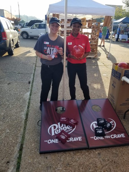 kids playing cornhole